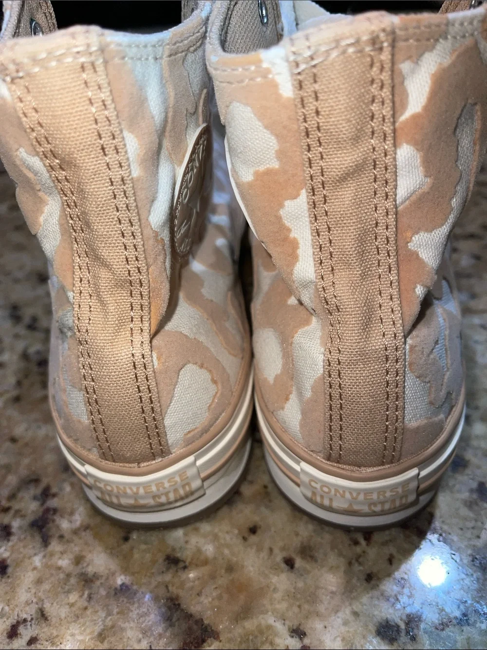 High-Top Converse Sneakers in Beige and White